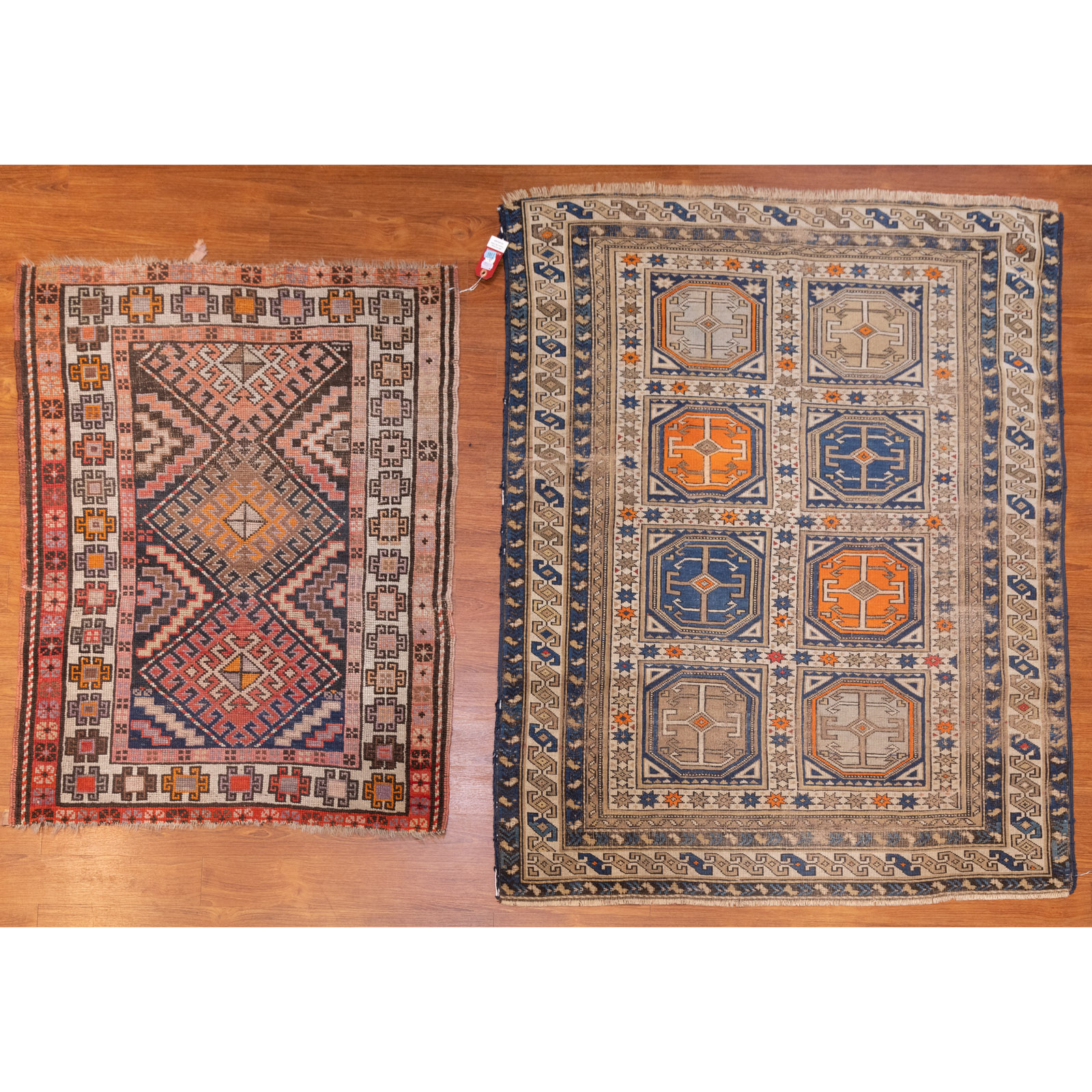 Appraisal: TWO ANTIQUE CAUCASIAN RUGS PERSIA First quarter- th century hand-knotted