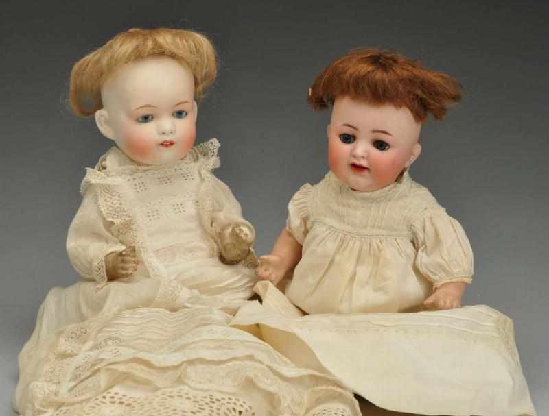 Appraisal: Lot of Character Baby Dolls Description Both with bisque heads