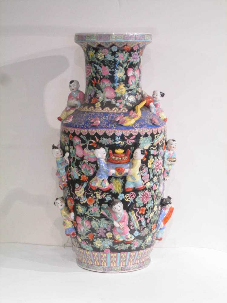 Appraisal: CHINESE FAMILLE NOIRE PORCELAIN VASE featuring colorful floral enamel decoration