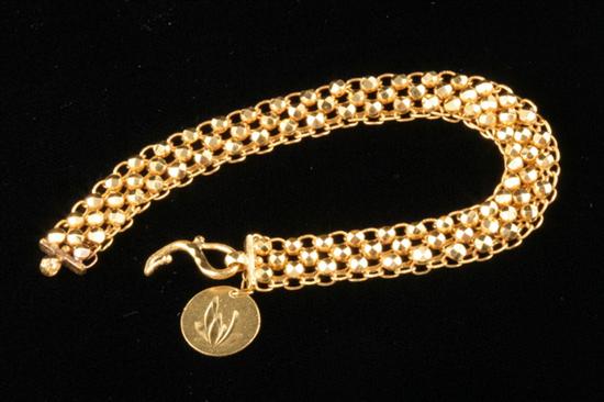 Appraisal: K YELLOW GOLD STRAP BRACELET L inches wt grams