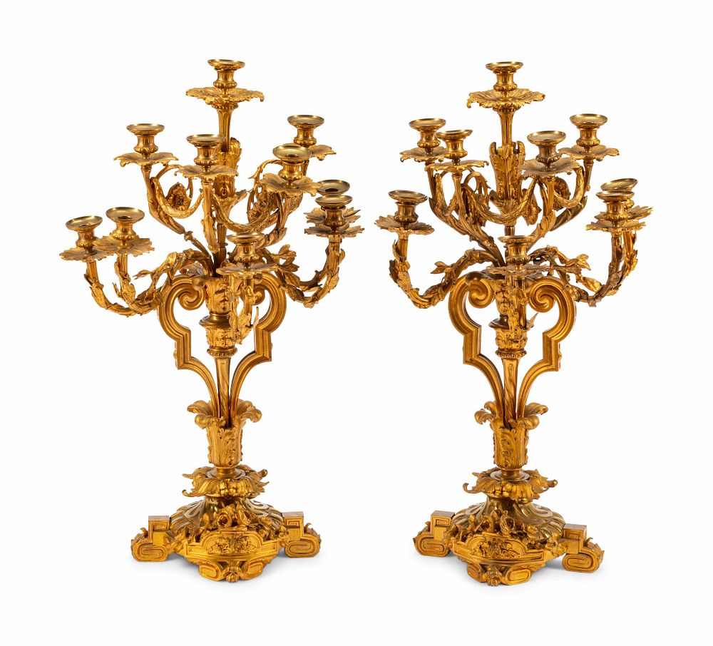 Appraisal: A Pair of Louis XVI Style Gilt Bronze Nine-Light Candelabra