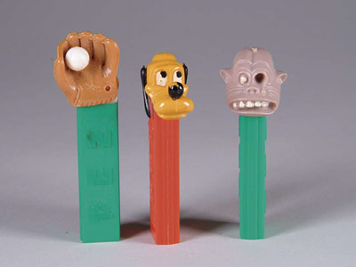 Appraisal: LOT OF PEZ DISPENSERS Disney's Pluto Baseball and glove One-eyed