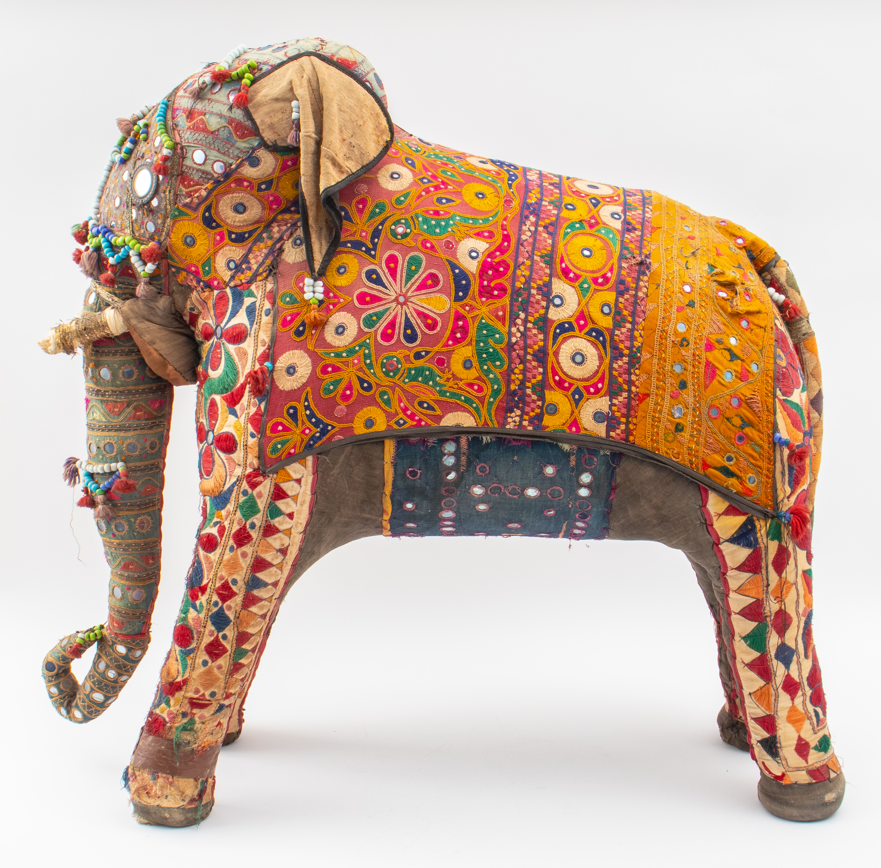 Appraisal: INDIAN EMBROIDERED CLOTH ELEPHANT STATUE Monumental Indian embroidered cloth-bound elephant