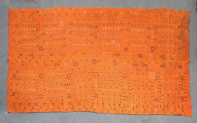 Appraisal: A NORTH AFRICAN ORANGE GROUND WALL HANGING with repetitive stylistic