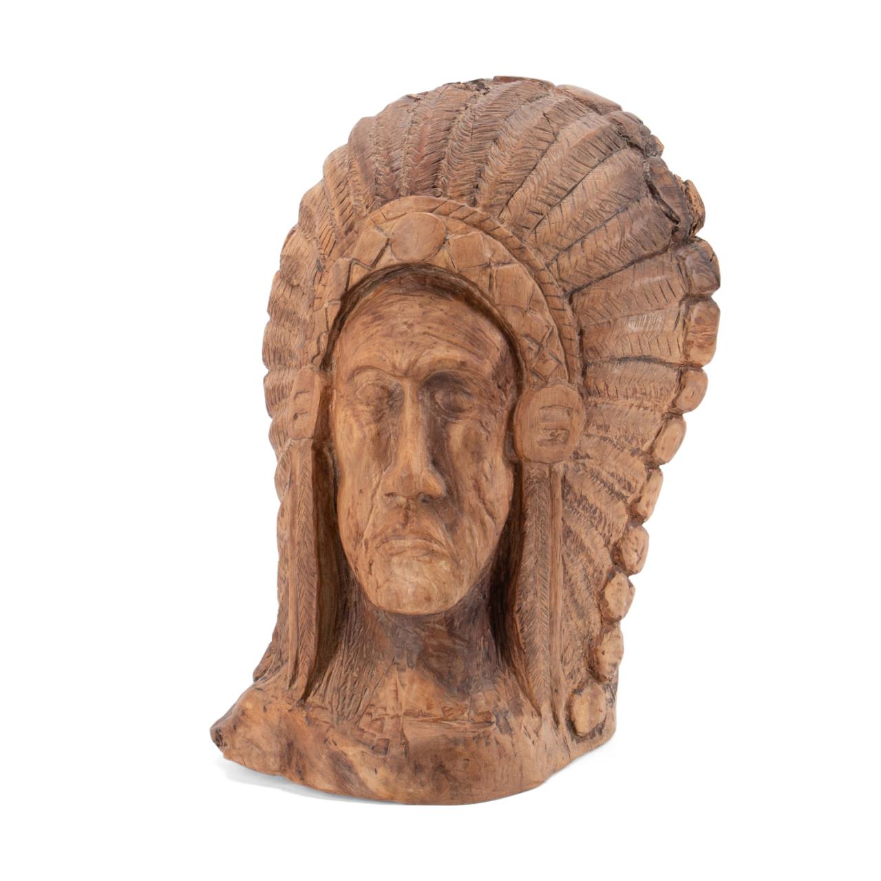 Appraisal: CARVED WOODEN BUST OF A NATIVE AMERICAN MAN Carved wooden