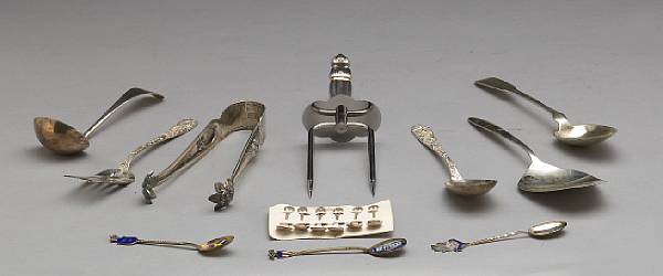 Appraisal: A group of sterling flatware Comprising Repousse serving spoon and