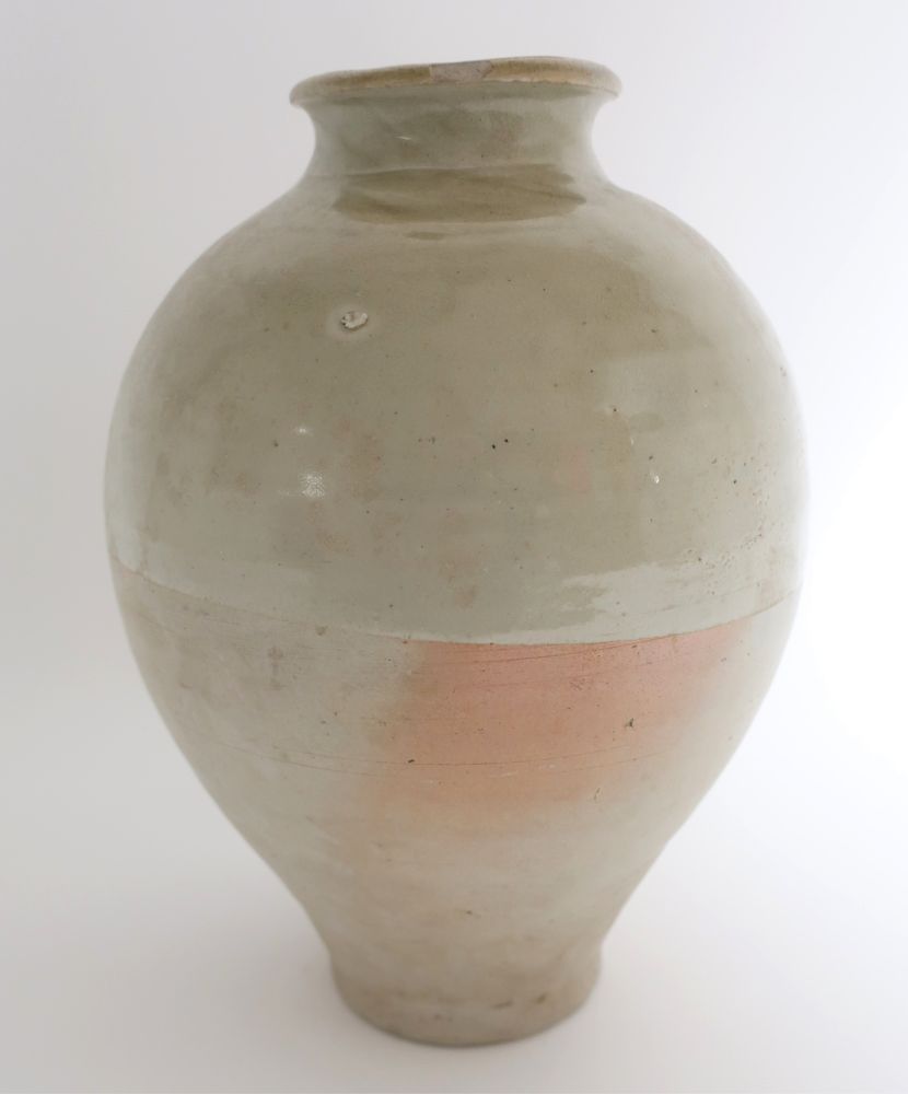 Appraisal: Tang Ovoid Glazed Jar Elegantly shaped ovoid jar with a