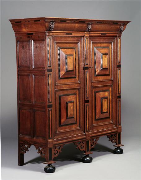 Appraisal: A Dutch oak and ebonised press cupboard th century the