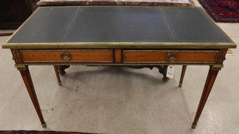 Appraisal: LOUIS XVI STYLE LEATHER-TOP WRITING TABLE French early th century