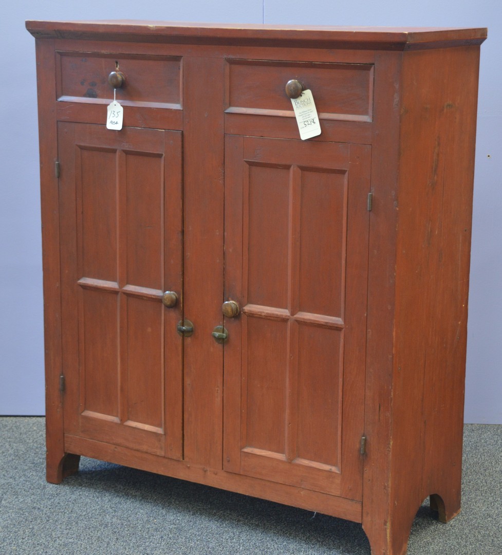 Appraisal: Pine red painted jelly cupboard drawers with edge molding over