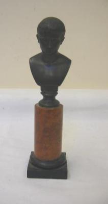 Appraisal: A BRONZE MALE BUST modelled after the antique head and