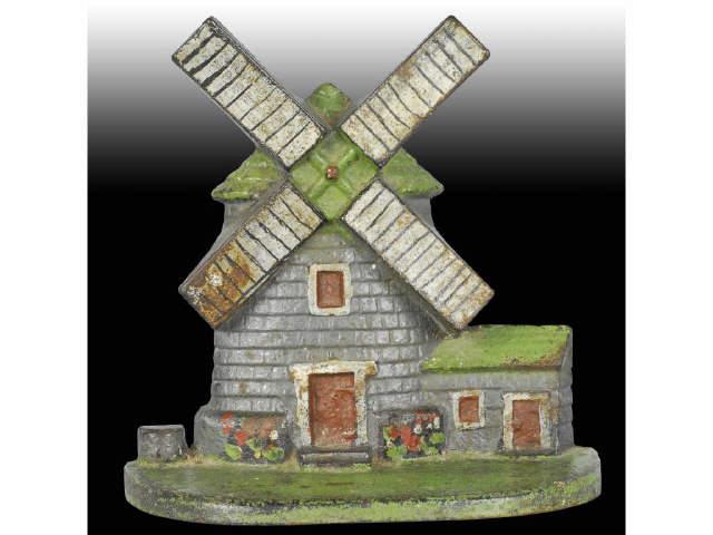 Appraisal: Windmill with Well Cast Iron Doorstop Description Made by National