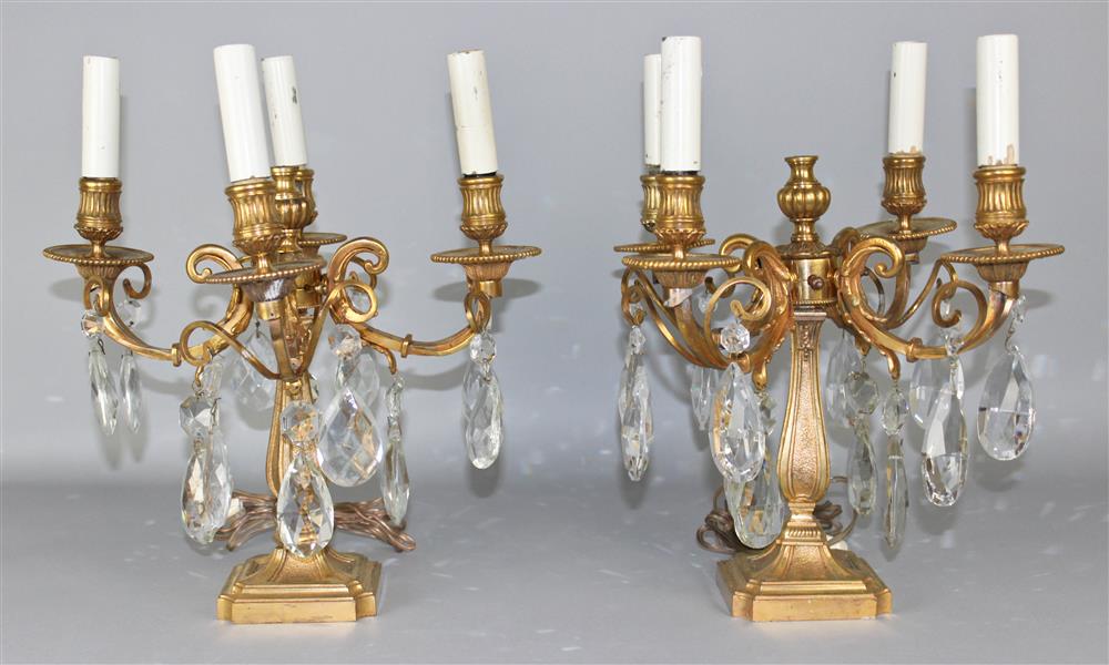 Appraisal: PAIR OF FRENCH GILT BRASS AND GLASS FOUR-LIGHT CANDELABRA MOUNTED