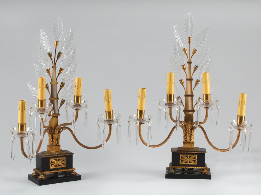 Appraisal: Pair of Black Marble and Bronze Four-Light Candelabra in the