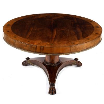 Appraisal: A Regency rosewood library table the circular top inlaid star