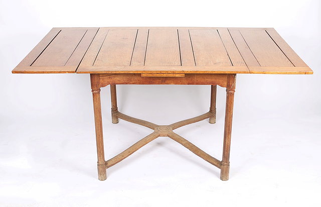 Appraisal: Cotswold SchoolOak draw leaf dining table circa - possibly Peter