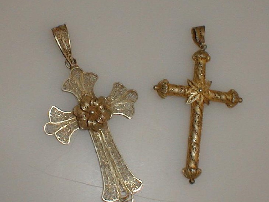 Appraisal: Two ornate filigree crucifix of Eastern influence