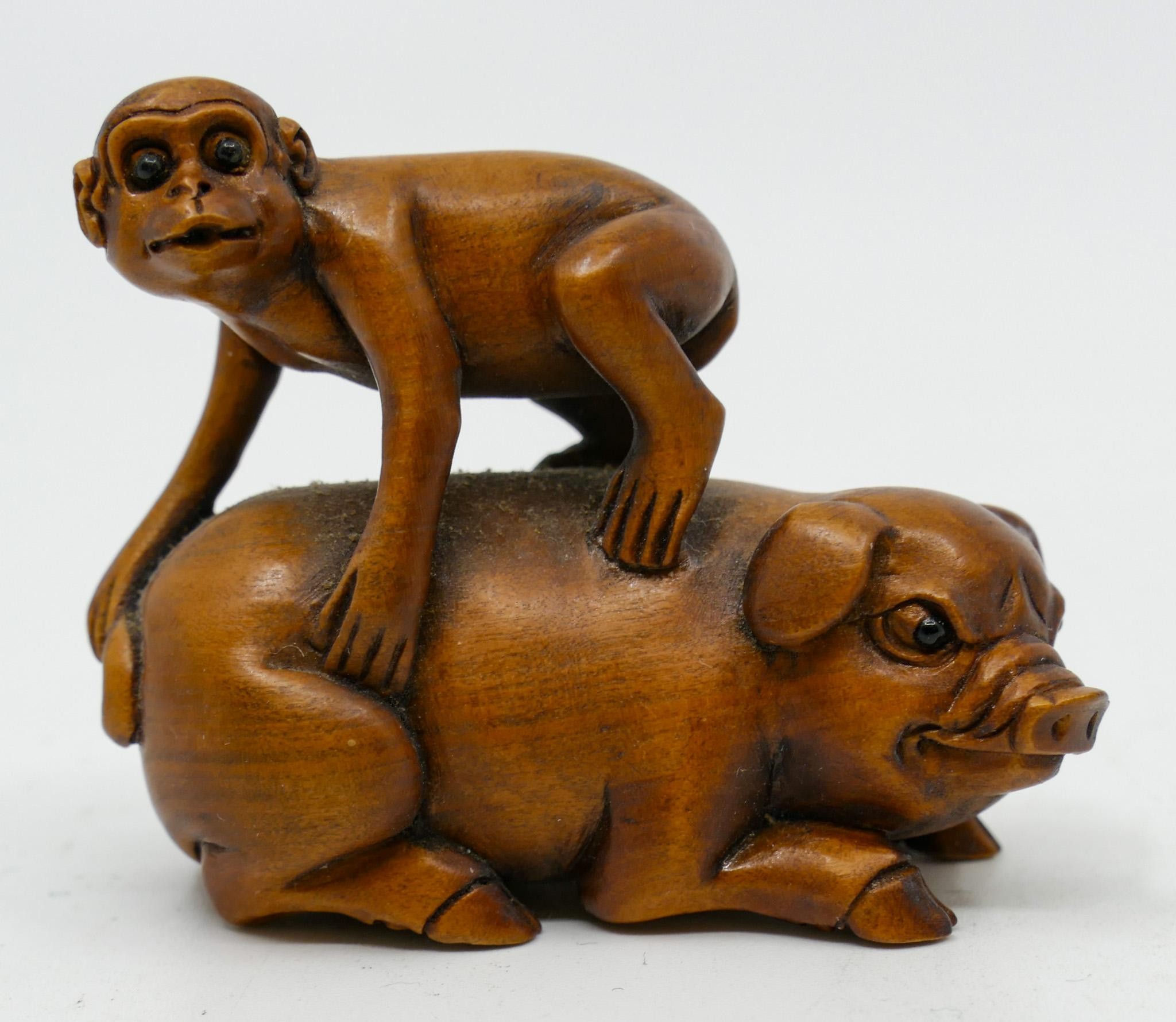 Appraisal: Japanese Monkey and Pig Carved Boxwood Netsuke ''