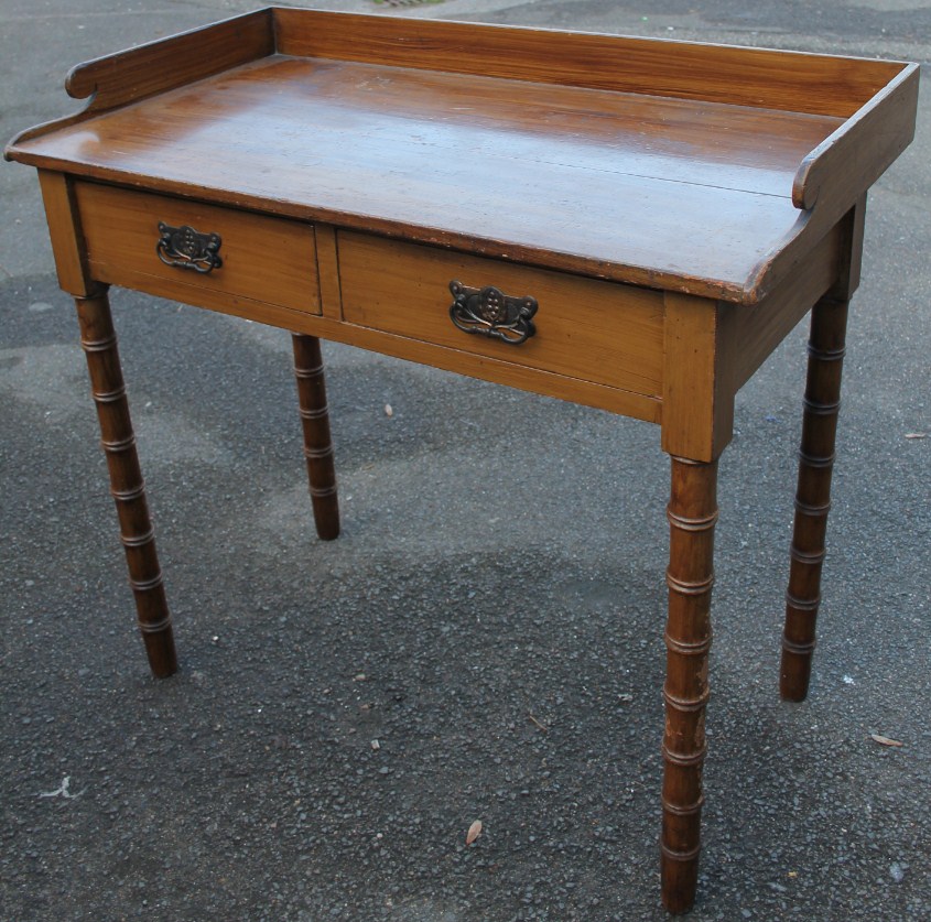 Appraisal: A thC painted pine Lincolnshire side table with a galleried