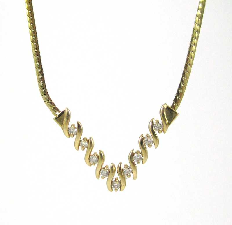 Appraisal: DIAMOND AND FOURTEEN KARAT GOLD NECKLACE measuring - inches in