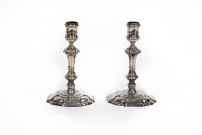 Appraisal: A pair of th Century style cast silver candlesticks CJ