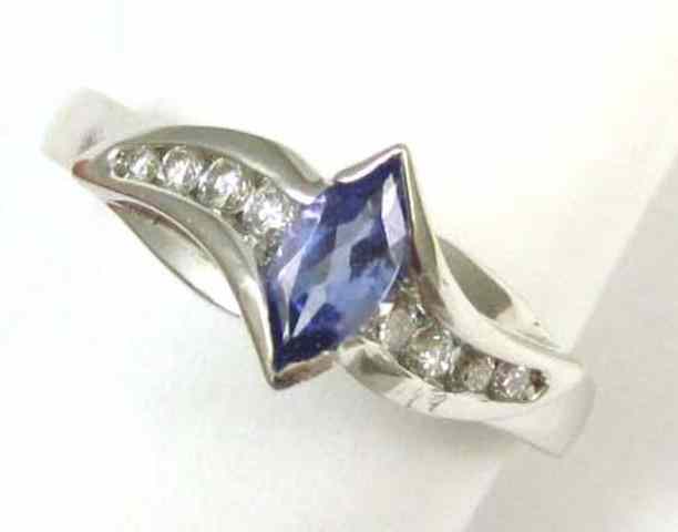 Appraisal: TANZANITE DIAMOND AND WHITE GOLD RING The k white gold