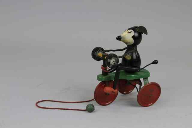 Appraisal: IGNATZ MOUSE ON TRICYCLE King Features Syndicate Chein made of