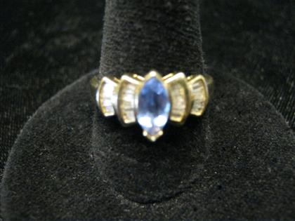 Appraisal: karat yellow gold diamond and tanzanite ringCentral marquise cut light