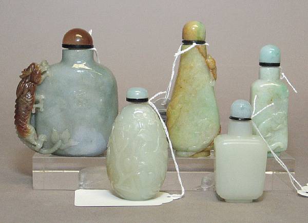 Appraisal: A group of five jade snuff bottles Including one of