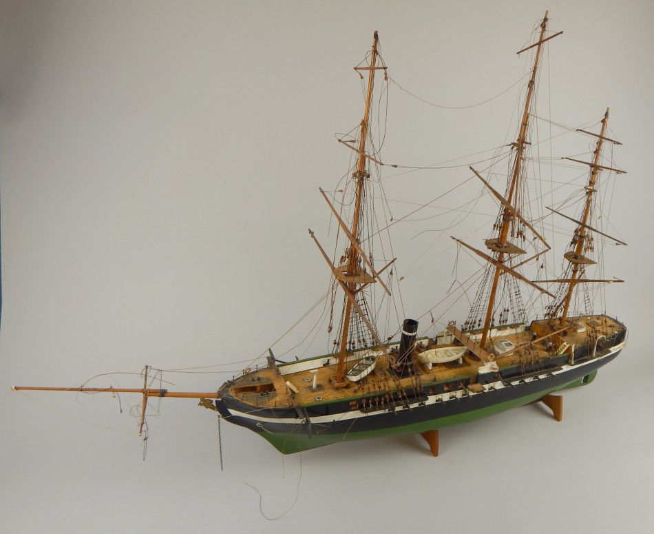 Appraisal: A scale model of three masted steam vessel with green