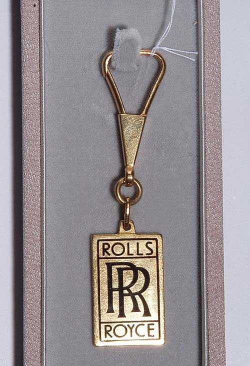 Appraisal: GOLD KEY CHAIN 'ROLLS ROYCE' Yellow gold g Rectangular key