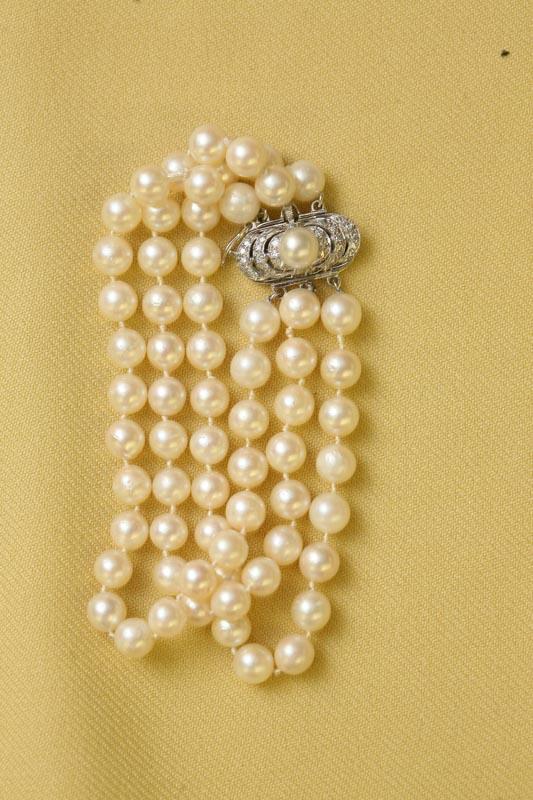 Appraisal: KWG PEARL BRACELET Three strand pearl bracelet with diamond and