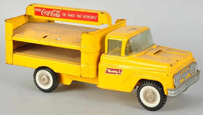 Appraisal: Lot of Pressed Steel Coca-Cola Trucks Includes one Marx and