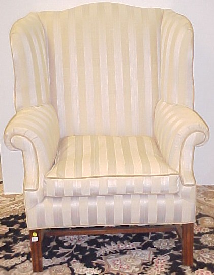 Appraisal: th C Chippendale style wing chair marlborough legs cream striped