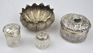 Appraisal: Three cut glass toilet jars with silver covers to w