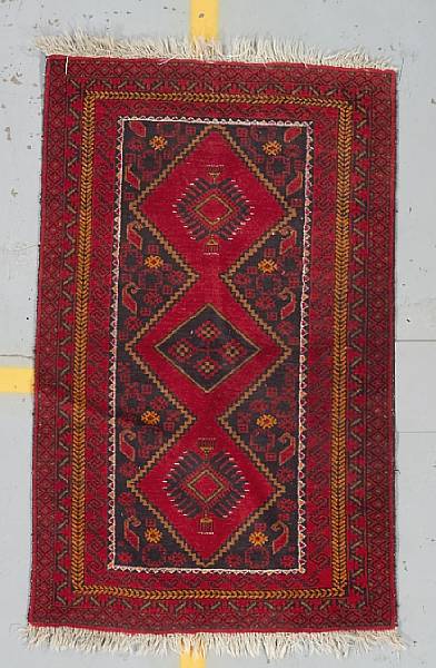 Appraisal: An Afghan rug size approximately ft in x ft in