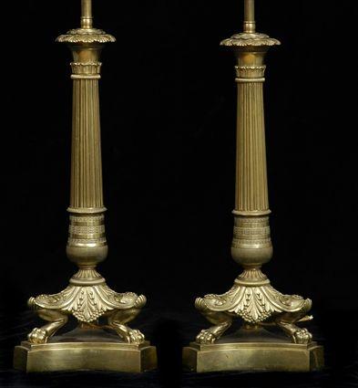 Appraisal: PAIR OF EMPIRE-STYLE GILT-METAL CANDLESTICK LAMPS Each reeded stem with