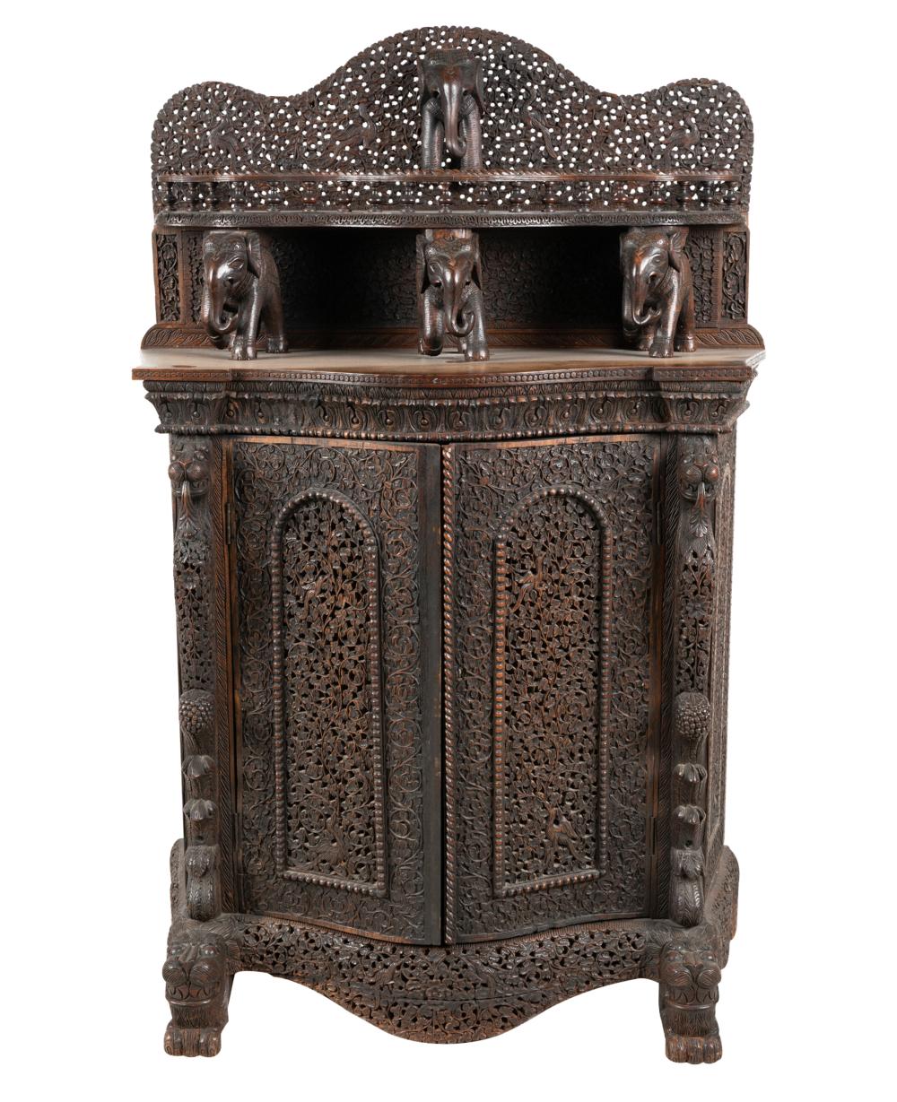 Appraisal: INDIAN OR SOTHEAST ASIAN CARVED WOOD CABINETintricately carved and pierced