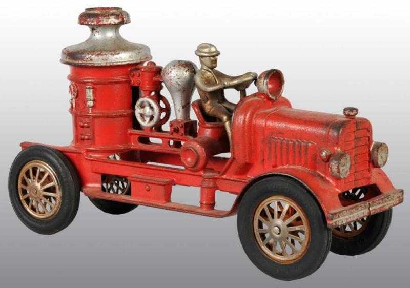 Appraisal: Cast Iron Fire Pumper Truck Toy Description Nickel-plated driver with