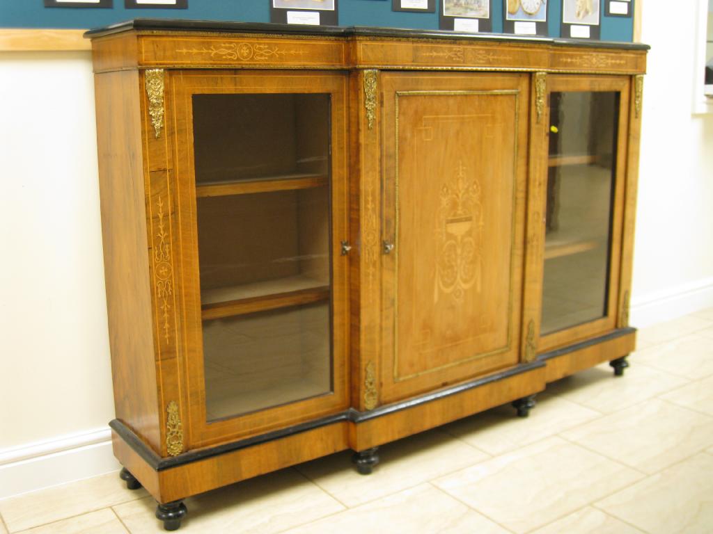 Appraisal: A Victorian walnut breakfront Cabinet centre section with panelled door