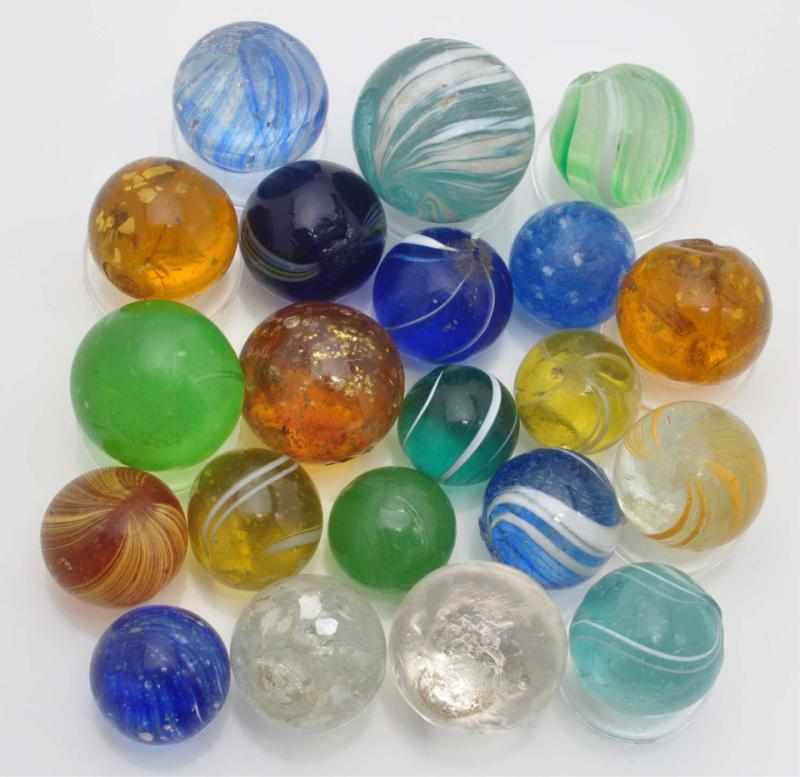 Appraisal: Lot of Handmade Marbles Description Lot includes micas mists with