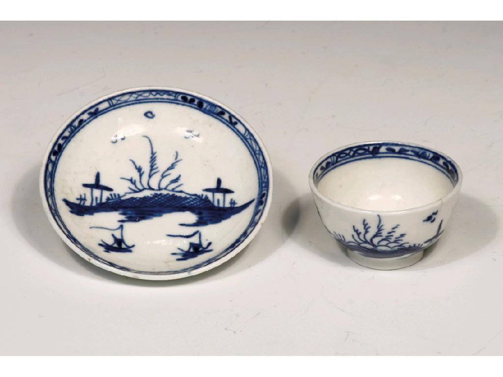 Appraisal: A MINIATURE CAUGHLEY BLUE AND WHITE TEA BOWL AND SAUCER