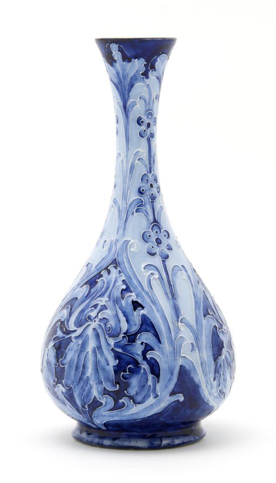 Appraisal: An English Pottery Vase MacIntyre Burslem Florianware of bottle form