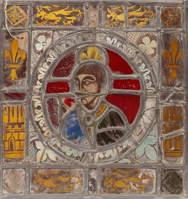 Appraisal: AN EARLY STAINED GLASS SQUARE PANEL with a central figural