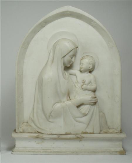 Appraisal: A marble relief sculpture of the Madonna and Child the