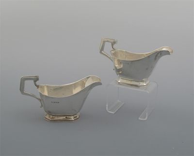 Appraisal: A pair of Art Deco sauceboats on canted oblong bases