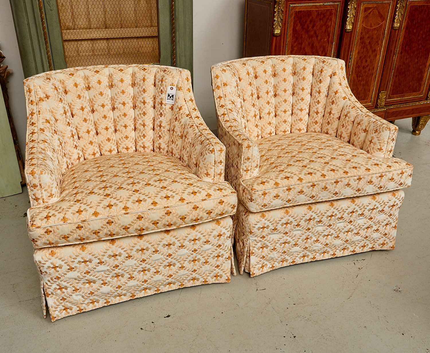 Appraisal: PAIR SKIRTED FAN BACK CLUB CHAIRS th c beautifully upholstered