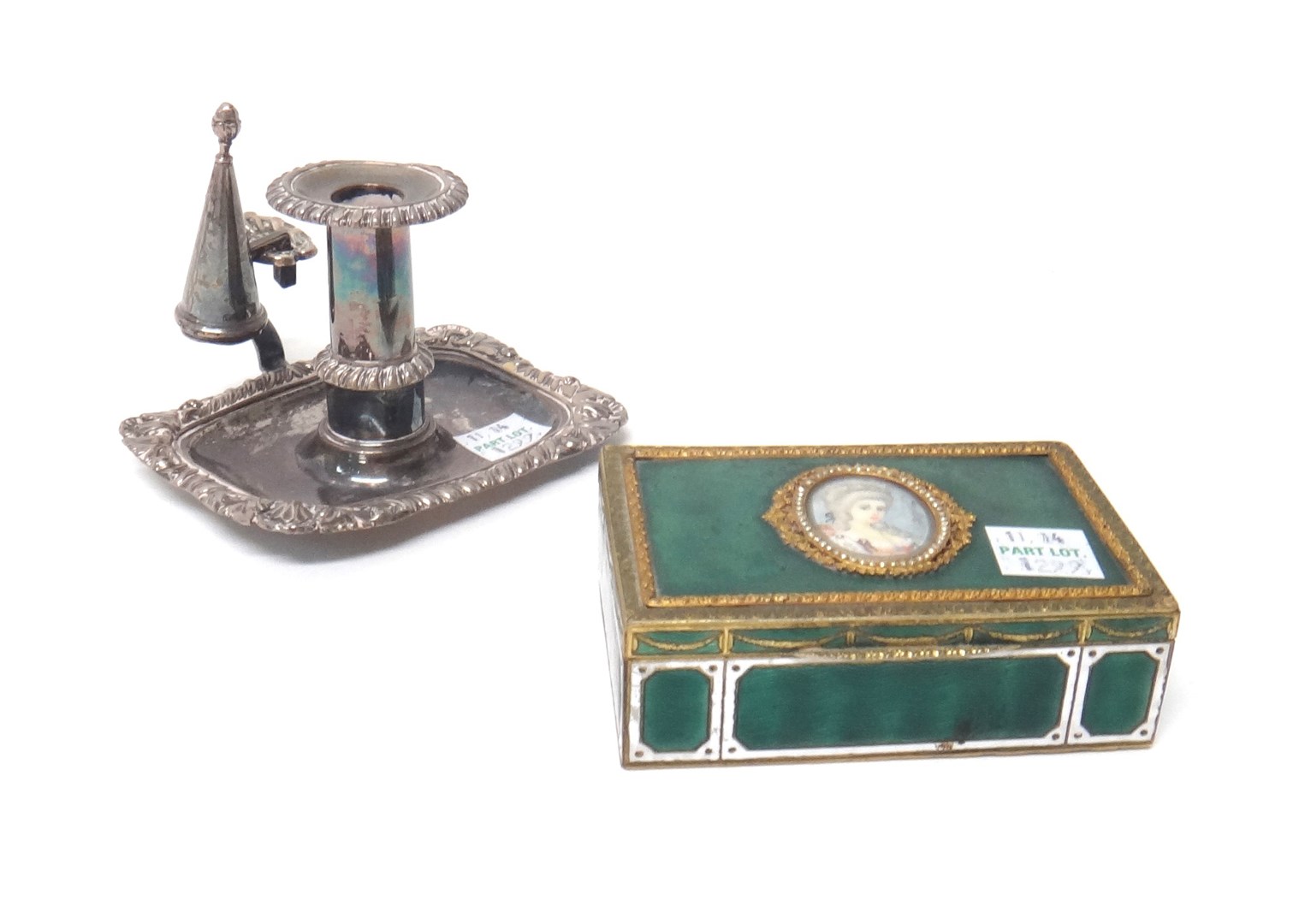 Appraisal: A Sheffield plated small chamberstick decorated with gadrooned borders by