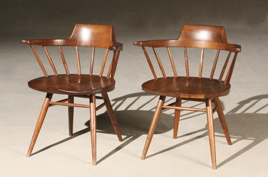 Appraisal: Pair of George Nakashima Walnut Captain's Chairs Dated Each having