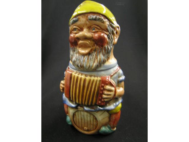 Appraisal: German Figural Pottery Character Stein gnome with accordian excellent